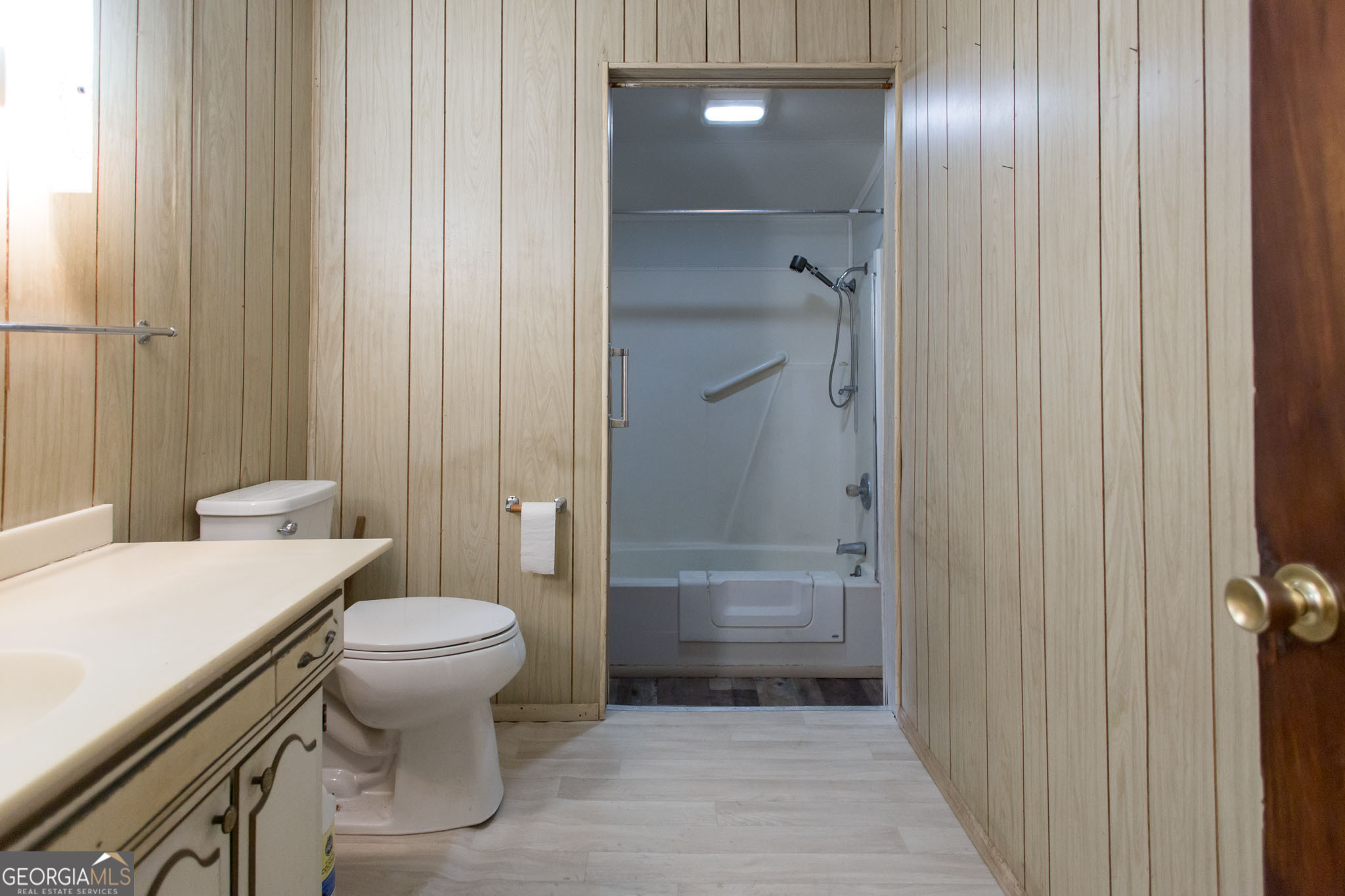 4618 Old Waltertown Road Waycross, GA 31503 - Photo 19 of 39 a bathroom with a sink a toilet and shower