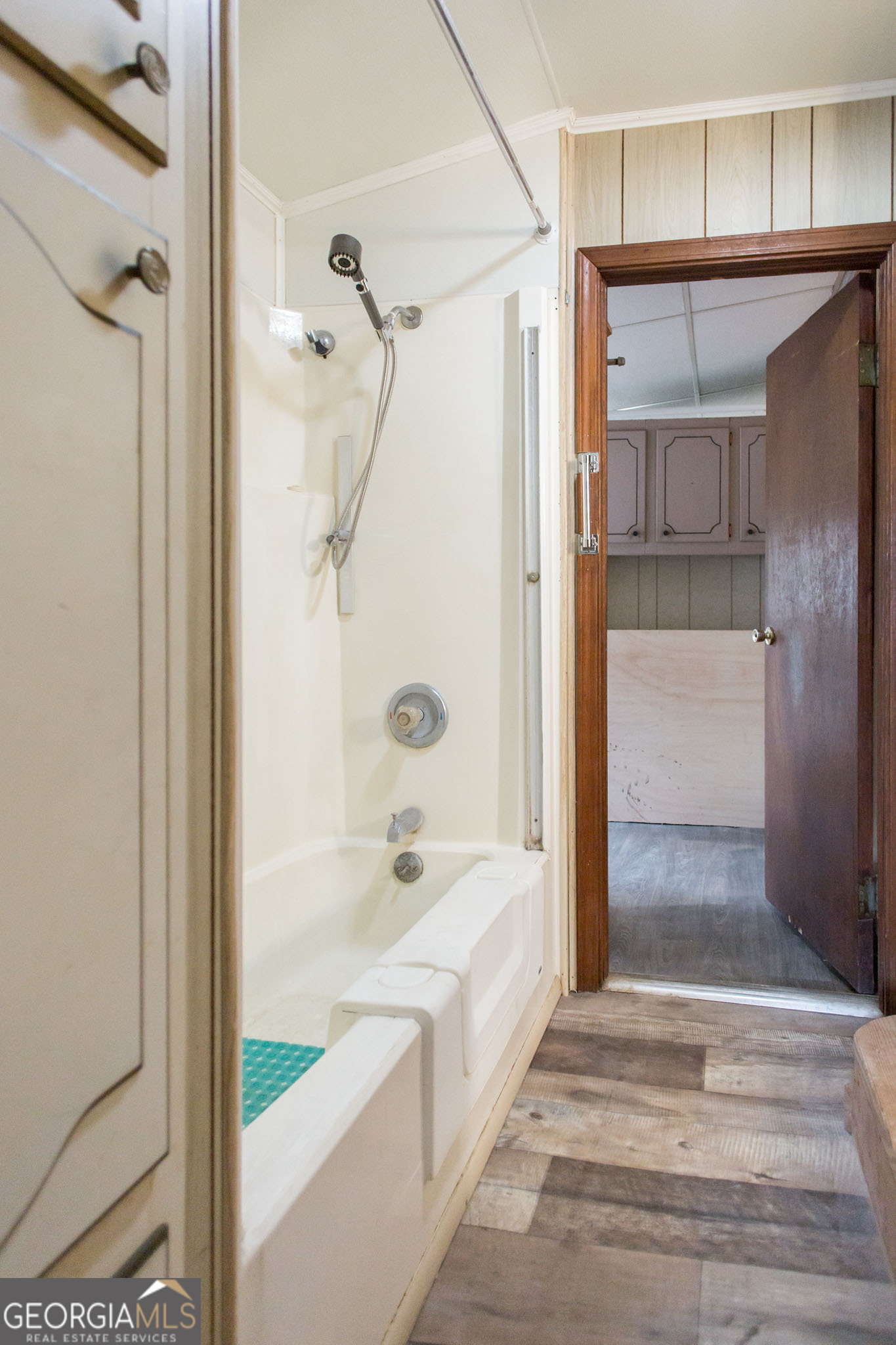 4618 Old Waltertown Road Waycross, GA 31503 - Photo 25 of 39 a bathroom with a bathtub and a shower
