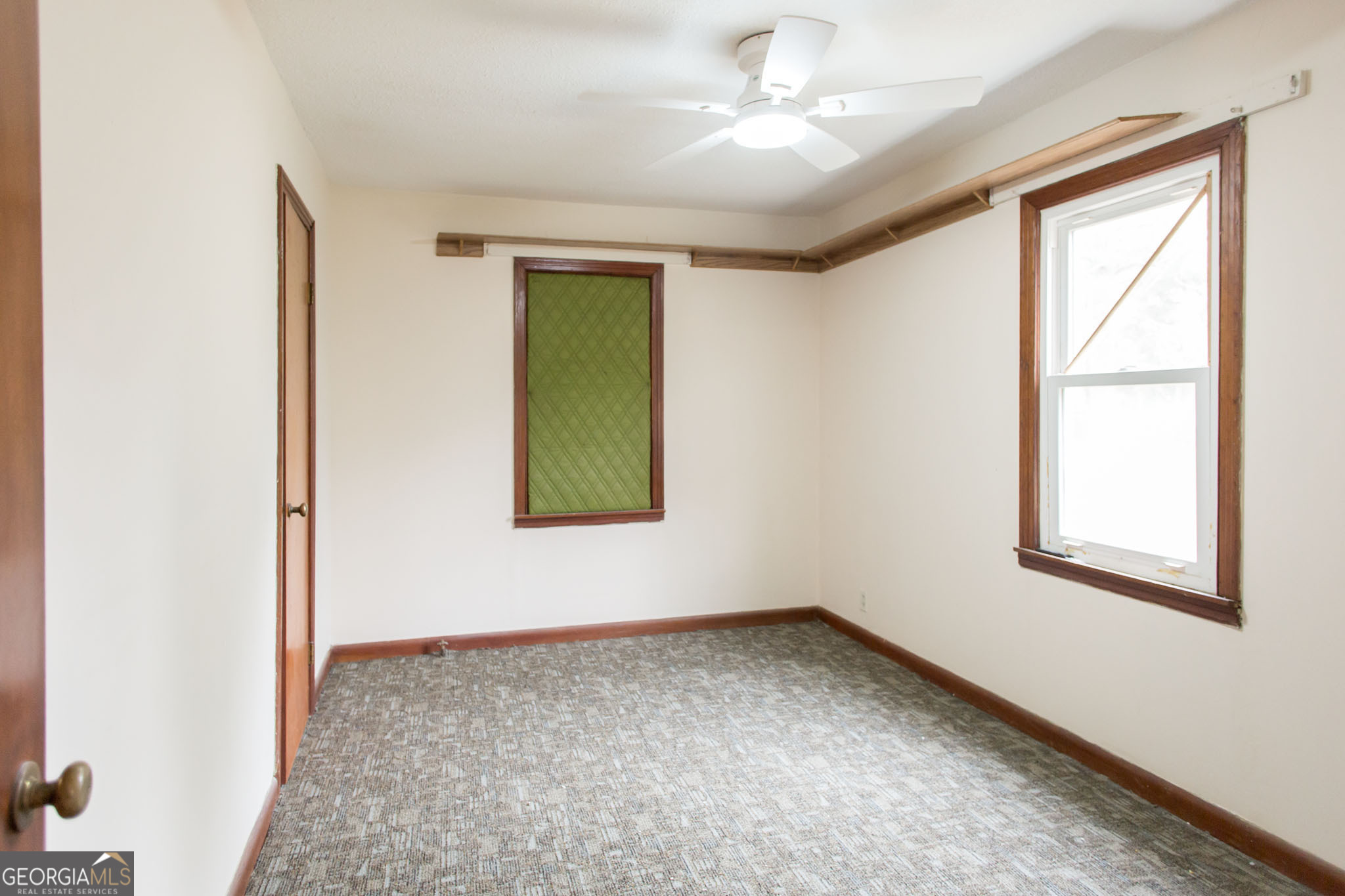 4618 Old Waltertown Road Waycross, GA 31503 - Photo 31 of 39 a view of an empty room with a window