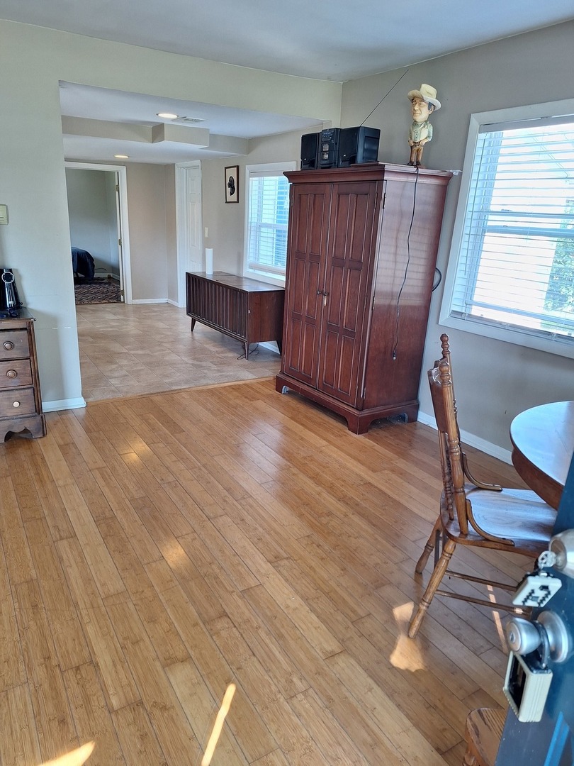 931 South Cedar Road New Lenox, IL 60451 - Photo 8 of 16 a view of a livingroom with furniture and wooden floor