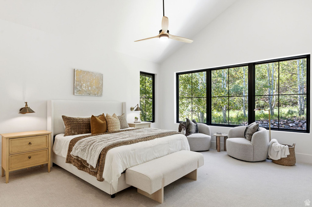 3027 Homestead Road Park City, UT 84098 - Photo 21 of 62 Bedroom featuring vaulted ceilings, a contemporary ceiling fan, and large black-framed windows