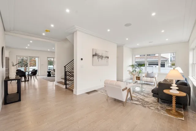 a view of a living room and entryway