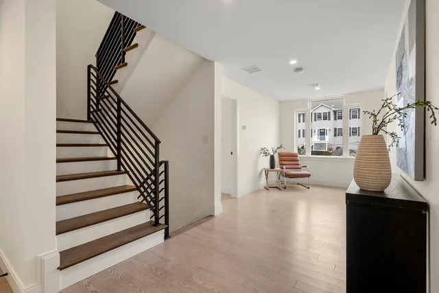 a bed room with a bed and a window