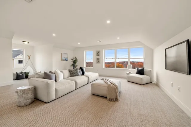 a picture of a room with a cabinet and a refrigerator
