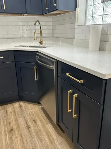 a bathroom with a sink and toilet