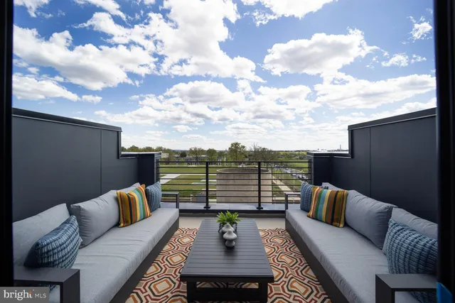 swimming pool view from the roof with furniture