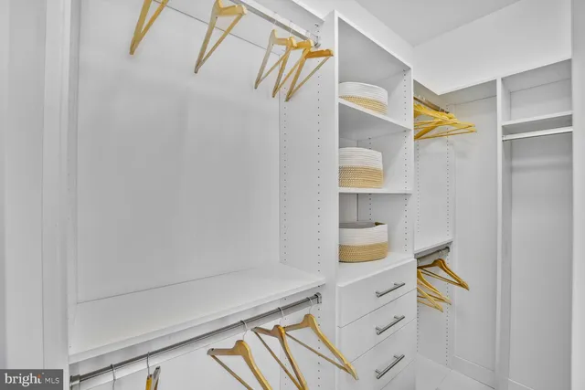 a bathroom with a mirror and a shower curtain