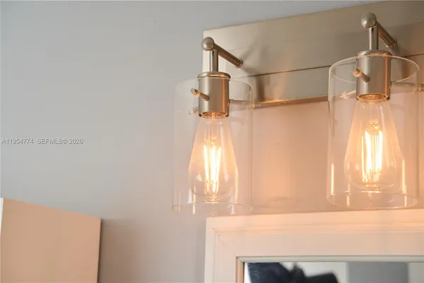 a bathroom with a window a sink and a window