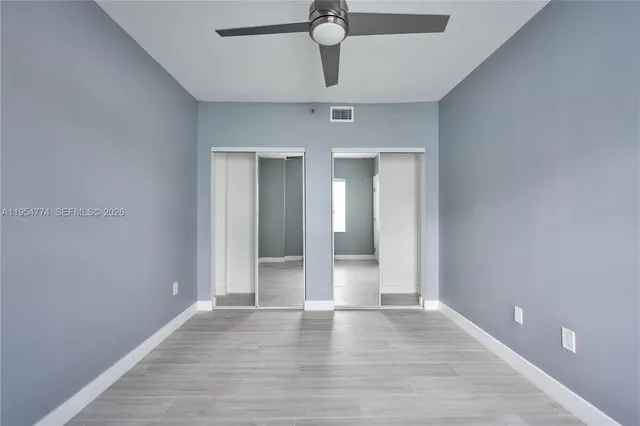 a view of an empty room and window