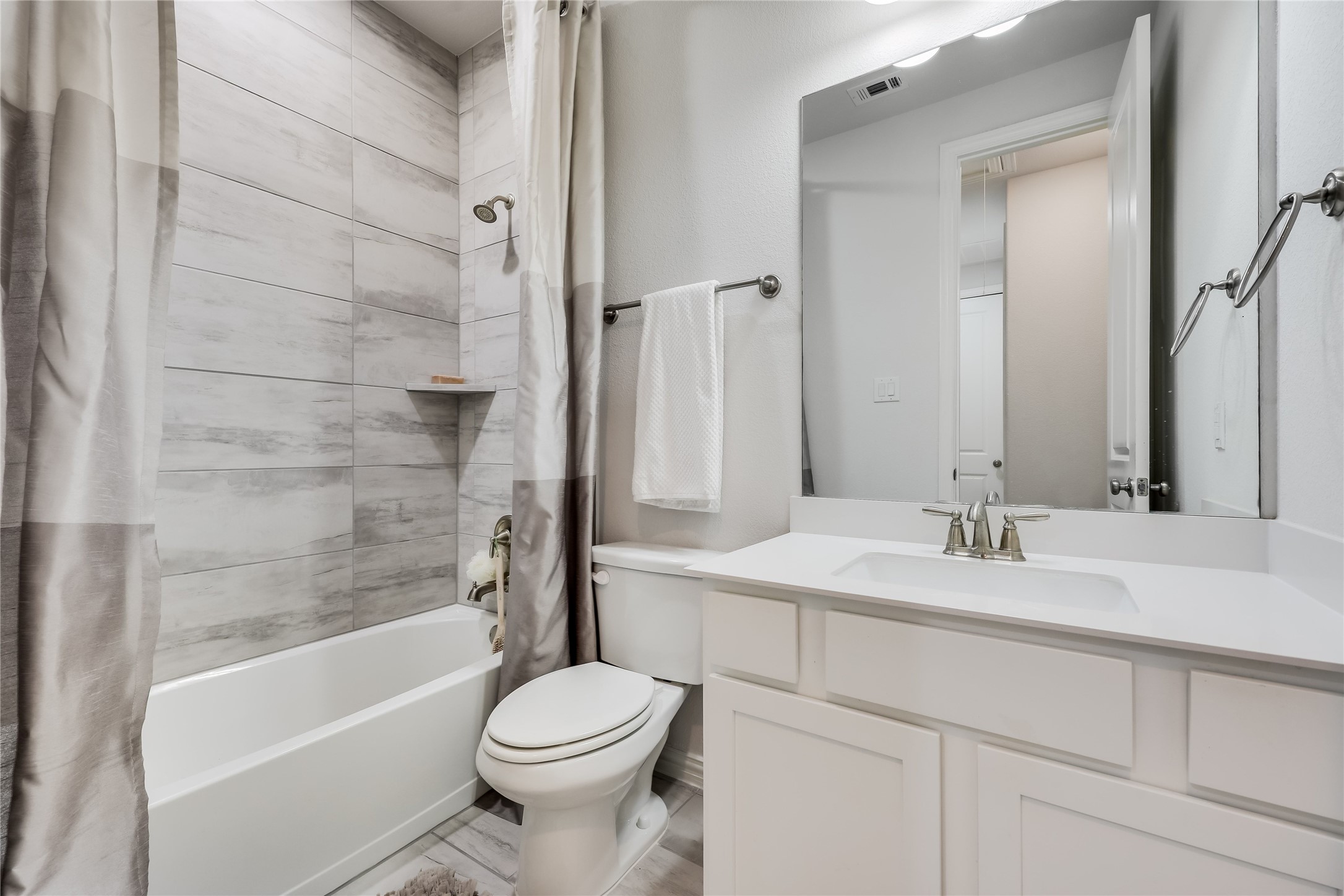 7705 Pace Ravine Drive Lago Vista, TX 78645 - Photo 24 of 40 Full bath featuring vanity and shower / bath combo