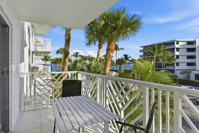 a bathroom with a sink a toilet a mirror and vanity