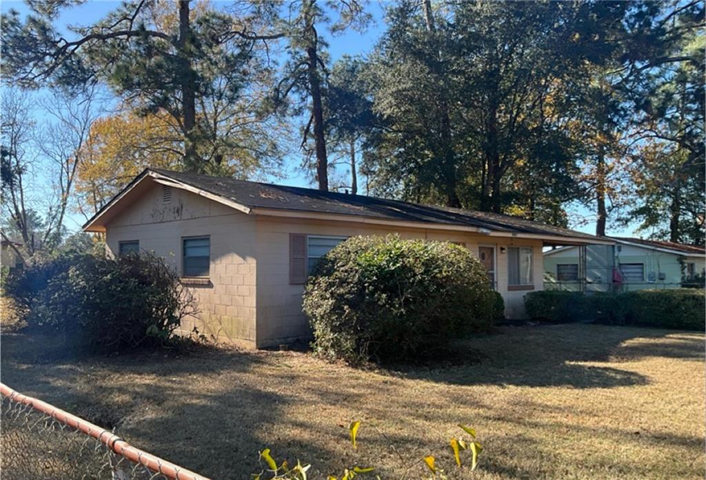 310 Tabby Lane Americus, GA 31719 - Photo 2 of 2 a view of a house with a yard