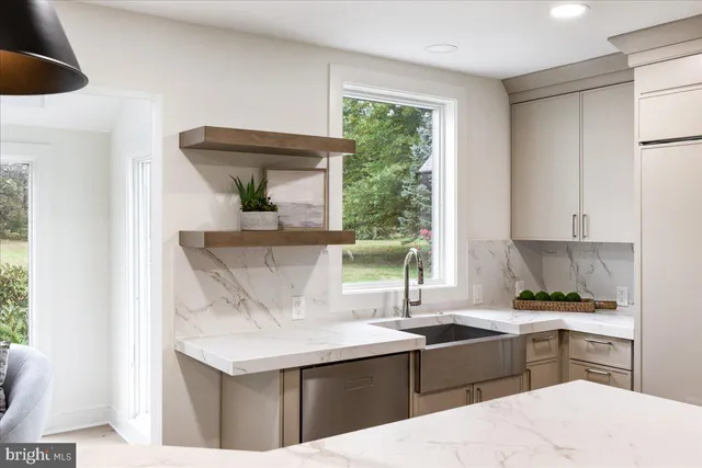 a bathroom with a sink and a shower