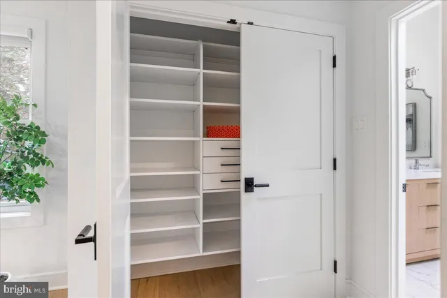 a view of a house with backyard sitting area and garden