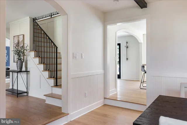 a bathroom with a sink a mirror and shower
