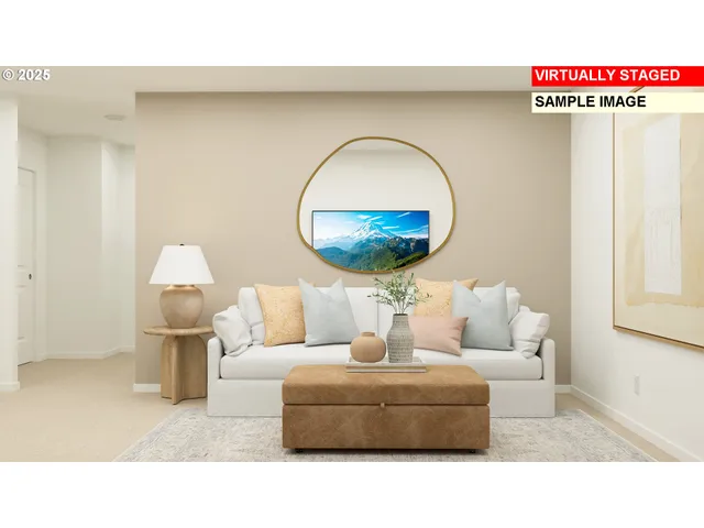 a living room with furniture and a mirror