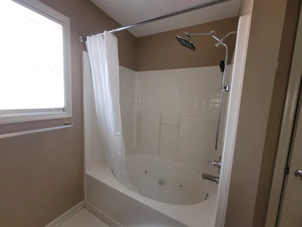 a bathroom with a bathtub