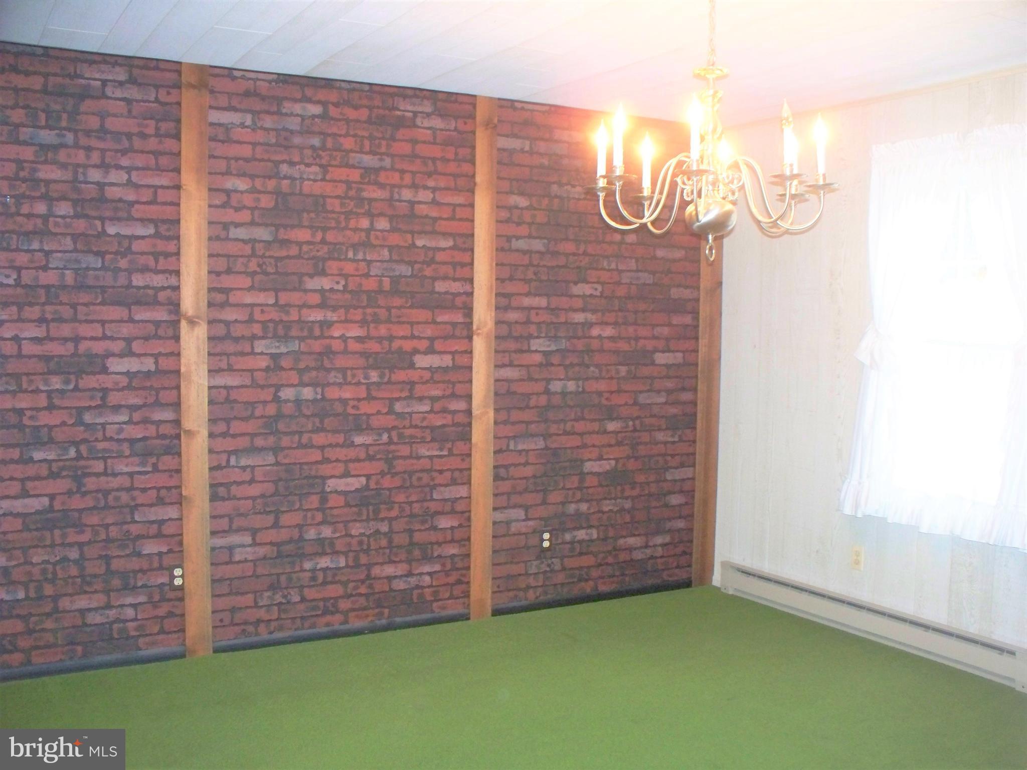 3118 Rocks Road Jarrettsville, MD 21084 - Photo 11 of 62 Dining Room - accent faux brick wall