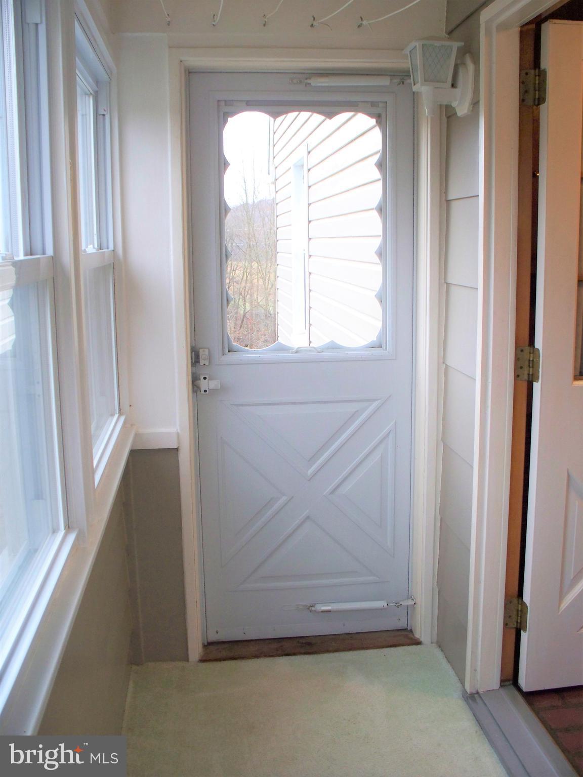 3118 Rocks Road Jarrettsville, MD 21084 - Photo 22 of 62 Enclosed Side Porch - door to side yard