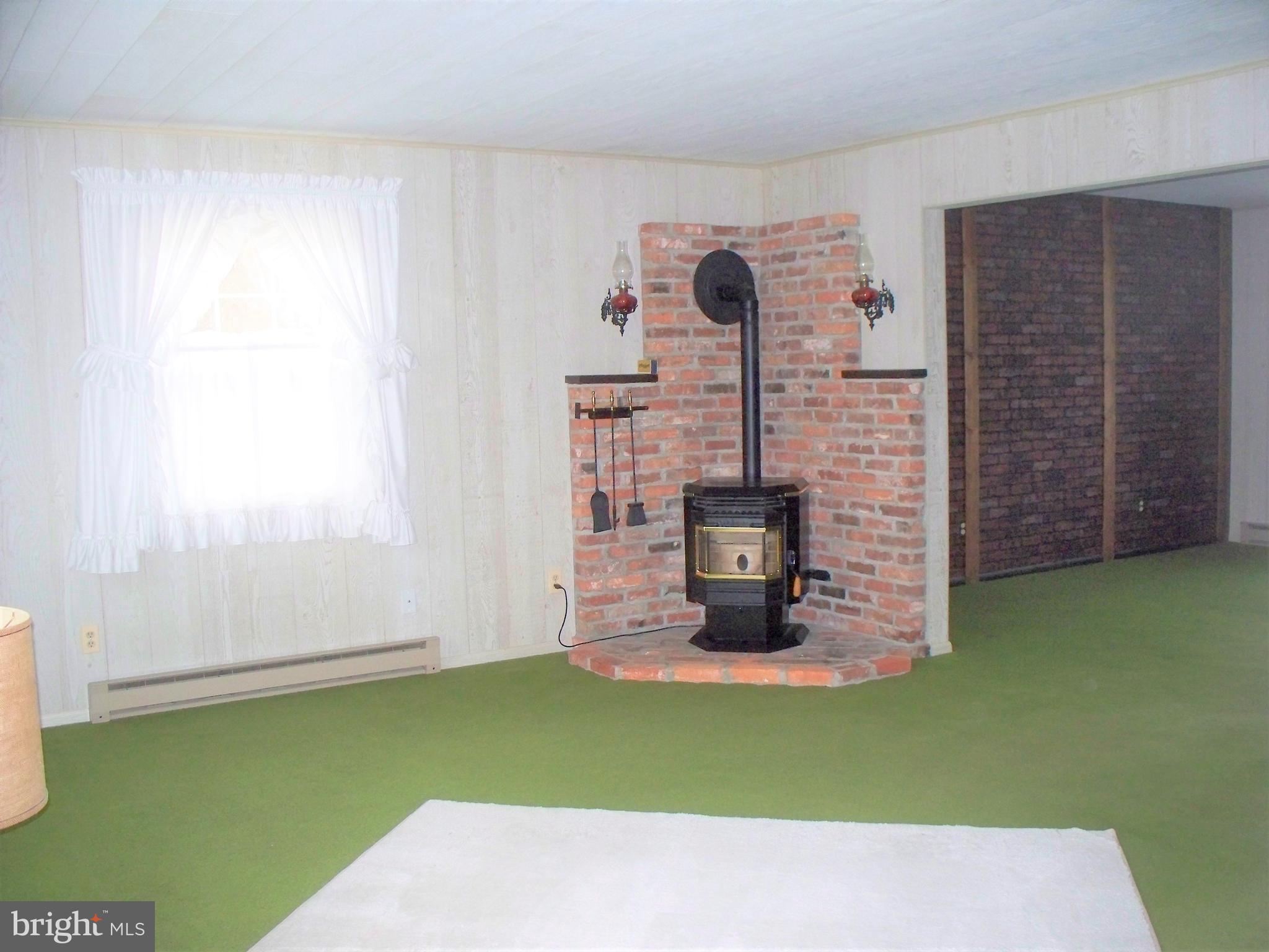3118 Rocks Road Jarrettsville, MD 21084 - Photo 8 of 62 Living Room - pellet stove
