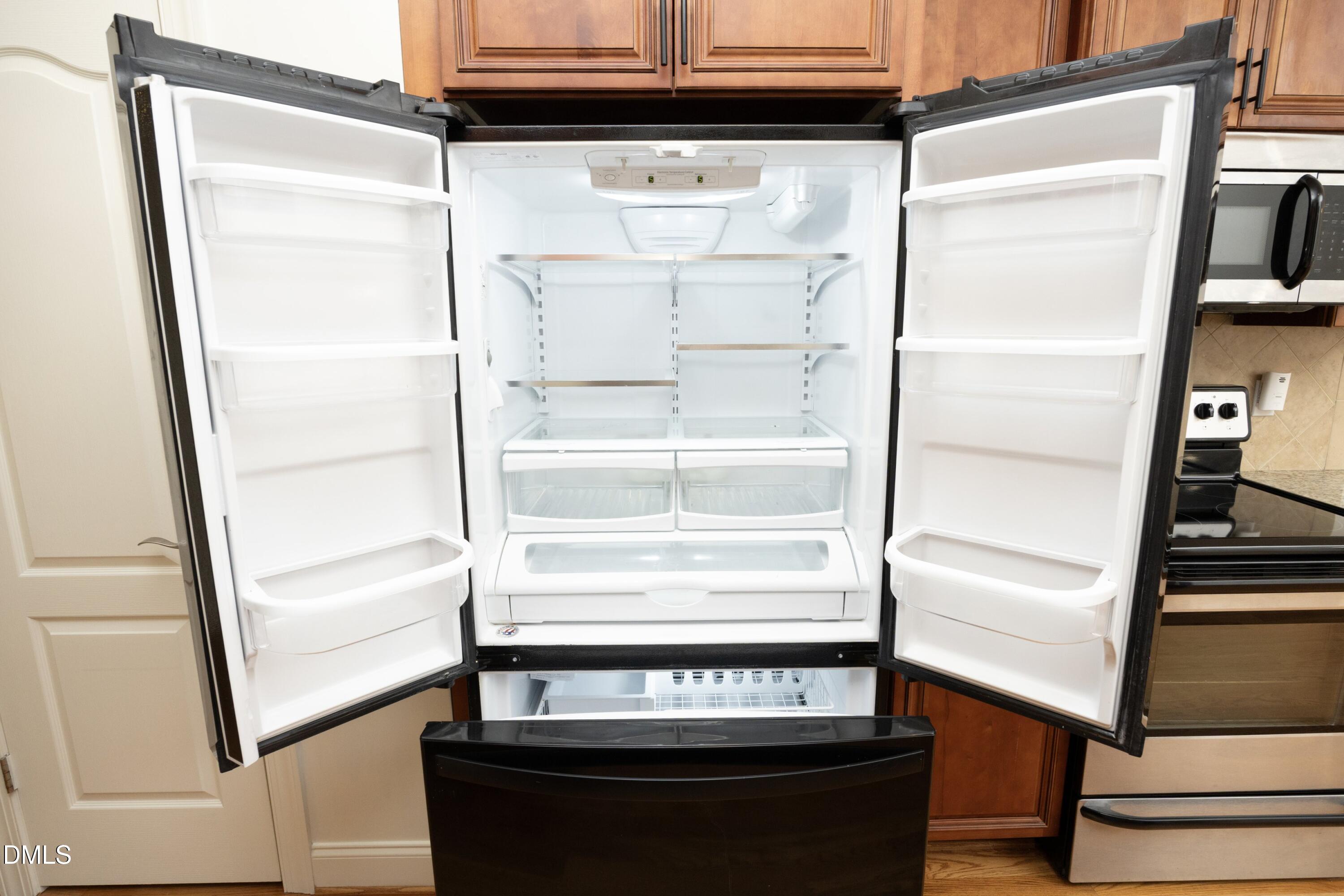 6120 Catandpolly Lane Raleigh, NC 27603 - Photo 18 of 36 a view of walk in closet with empty racks