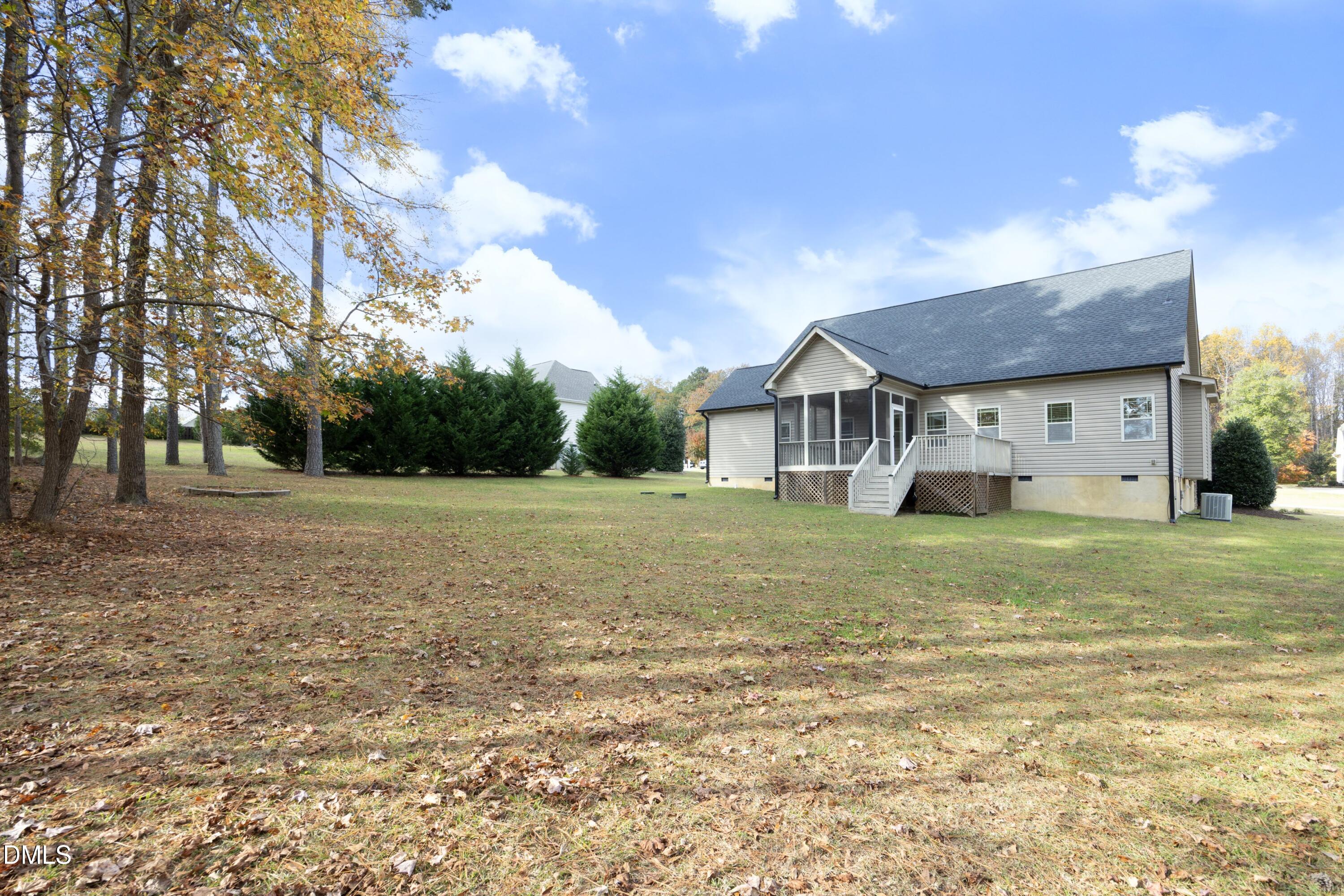 6120 Catandpolly Lane Raleigh, NC 27603 - Photo 33 of 36 a front view of house with yard and trees