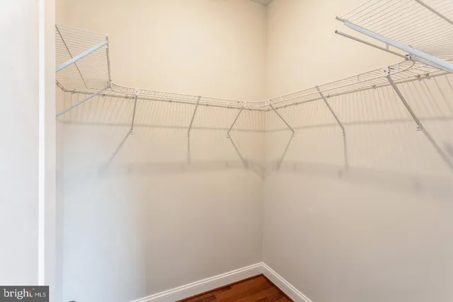 a view of a room with racks on the wall