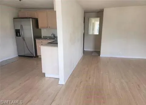 a view of a yard with a tree