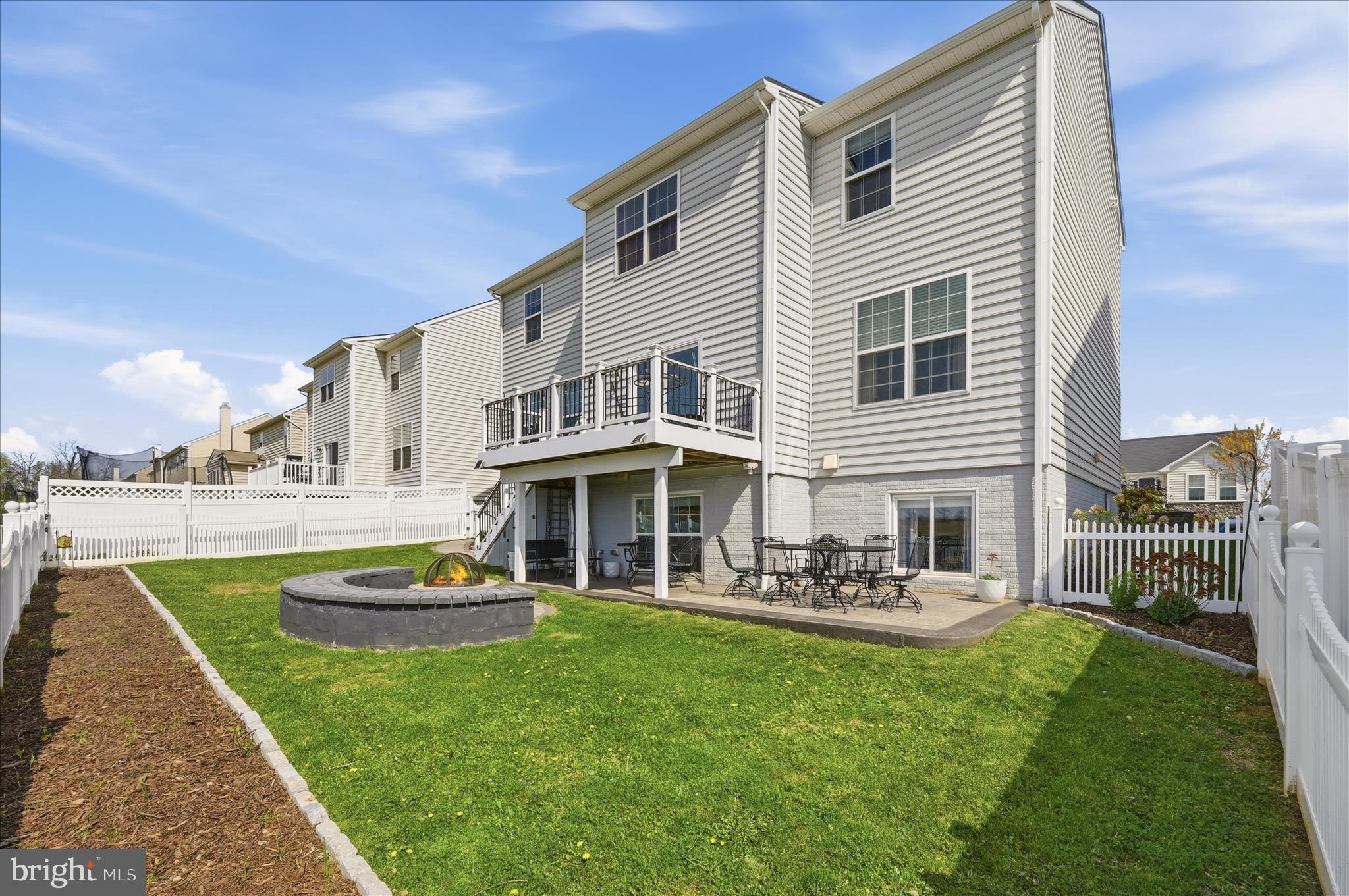 108 Shallow Creek Drive Ranson, WV 25438 - Photo 3 of 53 Rear deck, patio and firepit for outdoor enjoyment