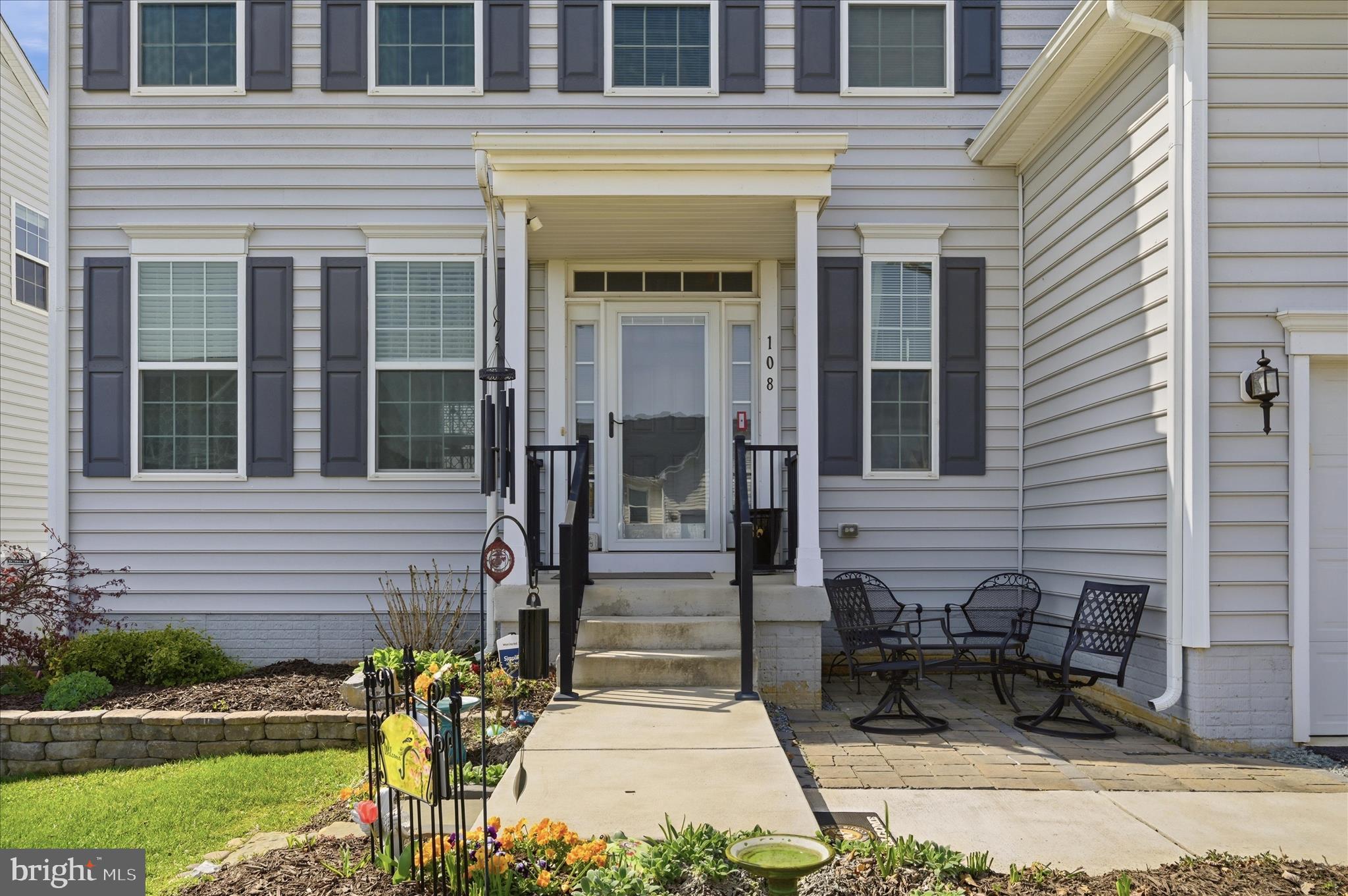 108 Shallow Creek Drive Ranson, WV 25438 - Photo 6 of 53 Front paver patio & portico