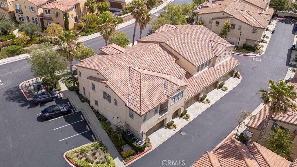 20335 Paseo Meriana Porter Ranch, CA 91326 - Photo 47 of 58 Aerial View of Well-Maintained Exterior with Garage Entry and Driveway