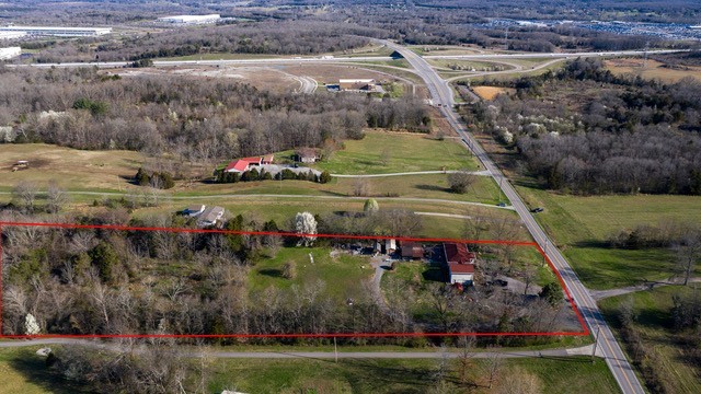 5386 Beckwith Road Mount Juliet, TN 37122 - Photo 2 of 6 a view of a swimming pool with a yard and plants