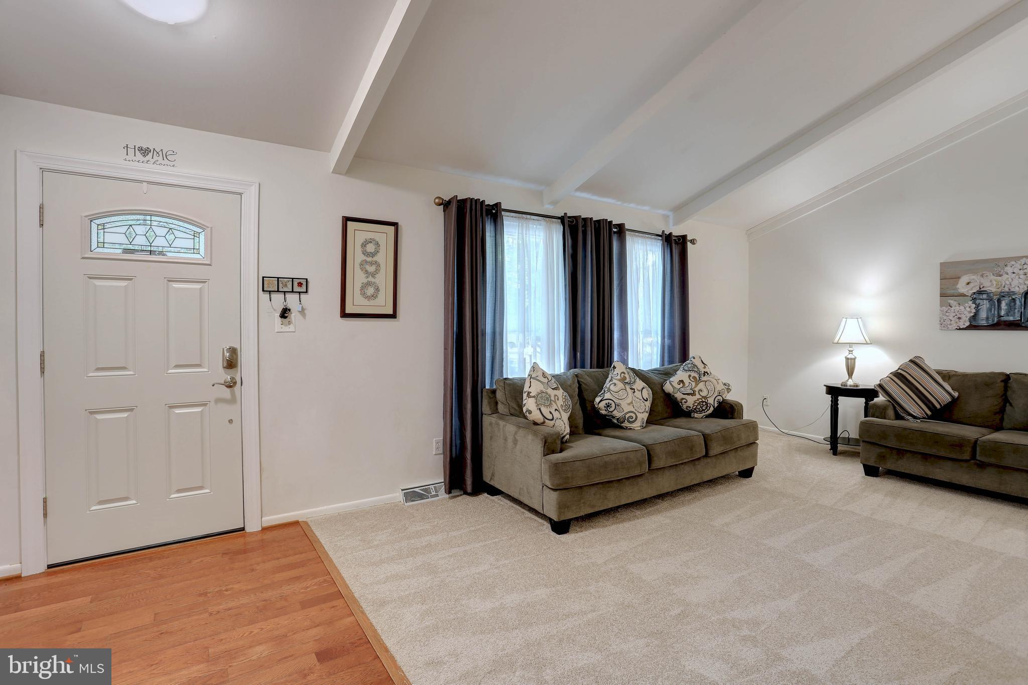 6128 Stevens Forest Road Columbia, MD 21045 - Photo 5 of 44 a living room with furniture and a window
