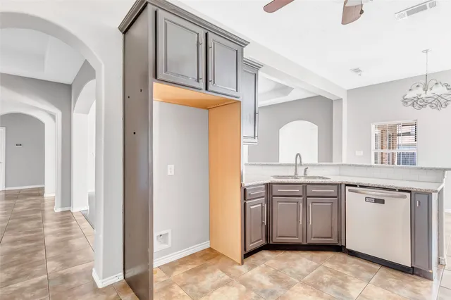 a spacious bathroom with a double vanity sink a mirror and a bathtub