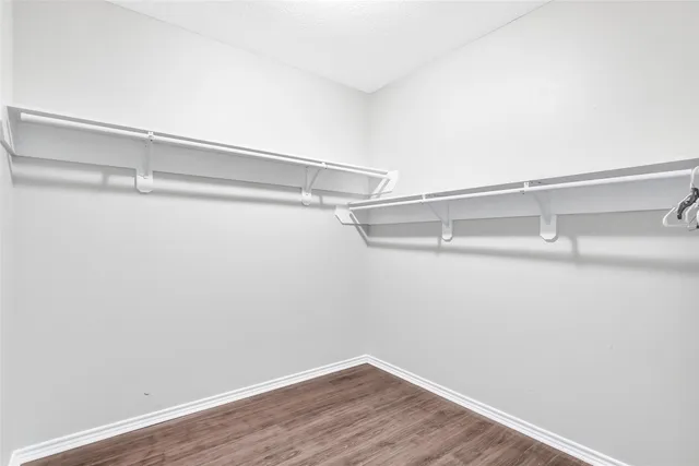 a view of a room with racks on the wall