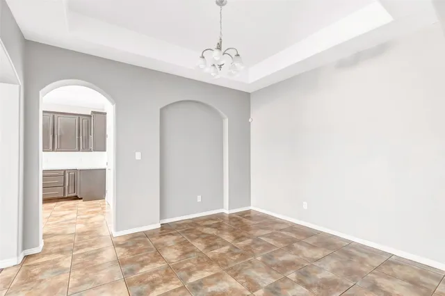 a view of a room with large windows