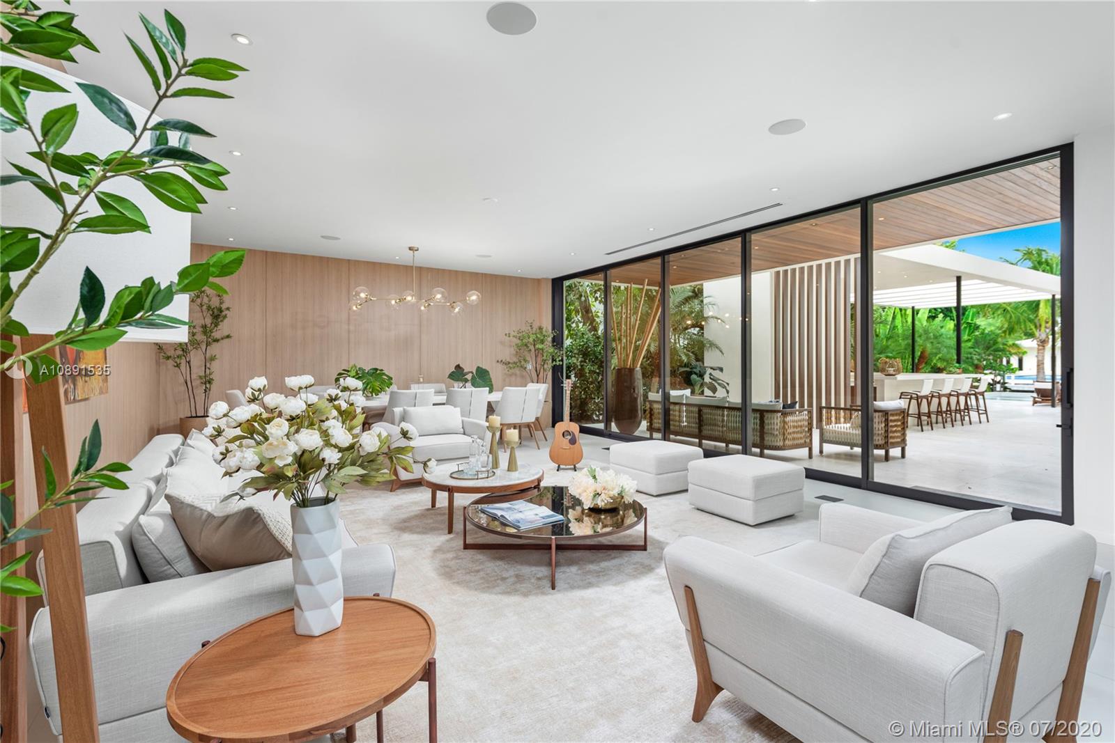 Sunset Islands Miami Beach, FL 33140 - Photo 12 of 72 a living room with furniture and a large window