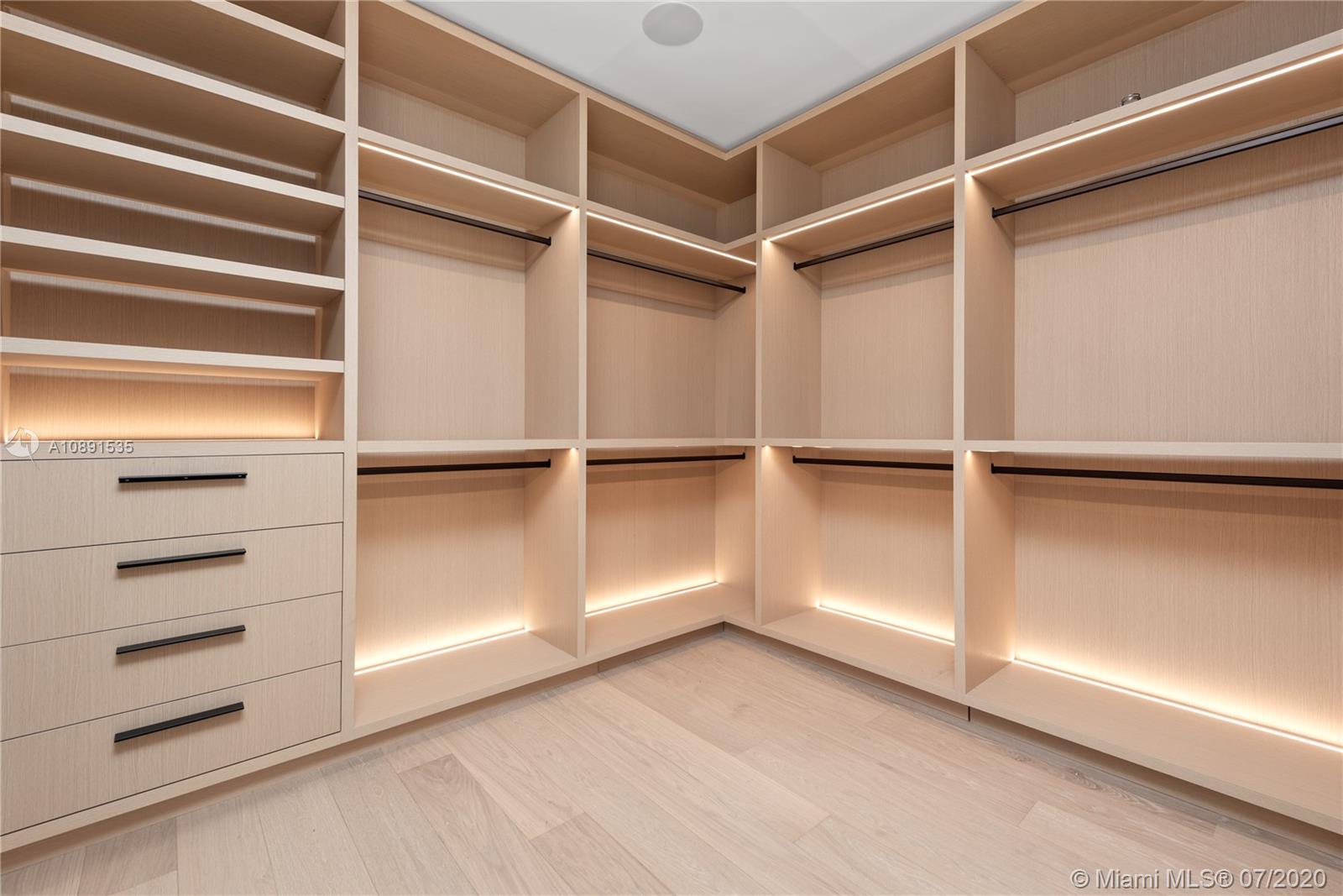 Sunset Islands Miami Beach, FL 33140 - Photo 43 of 72 a view of an empty walk in closet