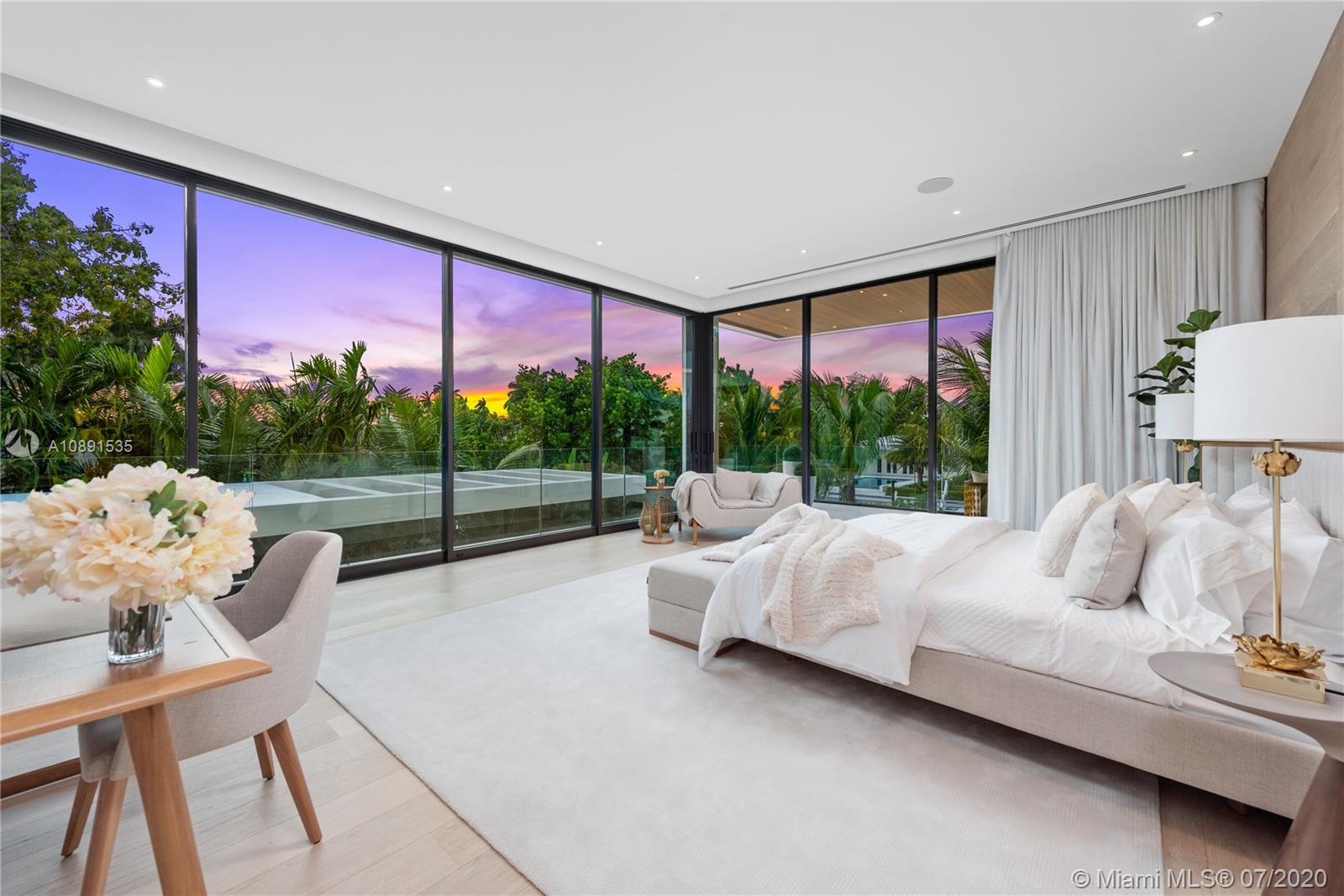 Sunset Islands Miami Beach, FL 33140 - Photo 47 of 72 a living room with furniture and a floor to ceiling window