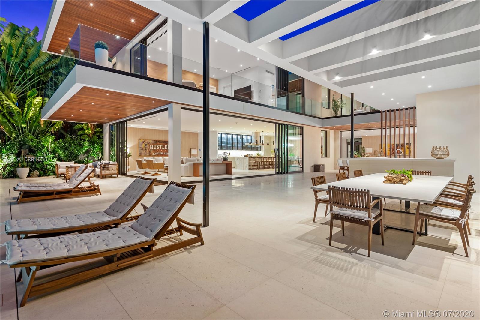 Sunset Islands Miami Beach, FL 33140 - Photo 64 of 72 a room with lots of furniture and windows