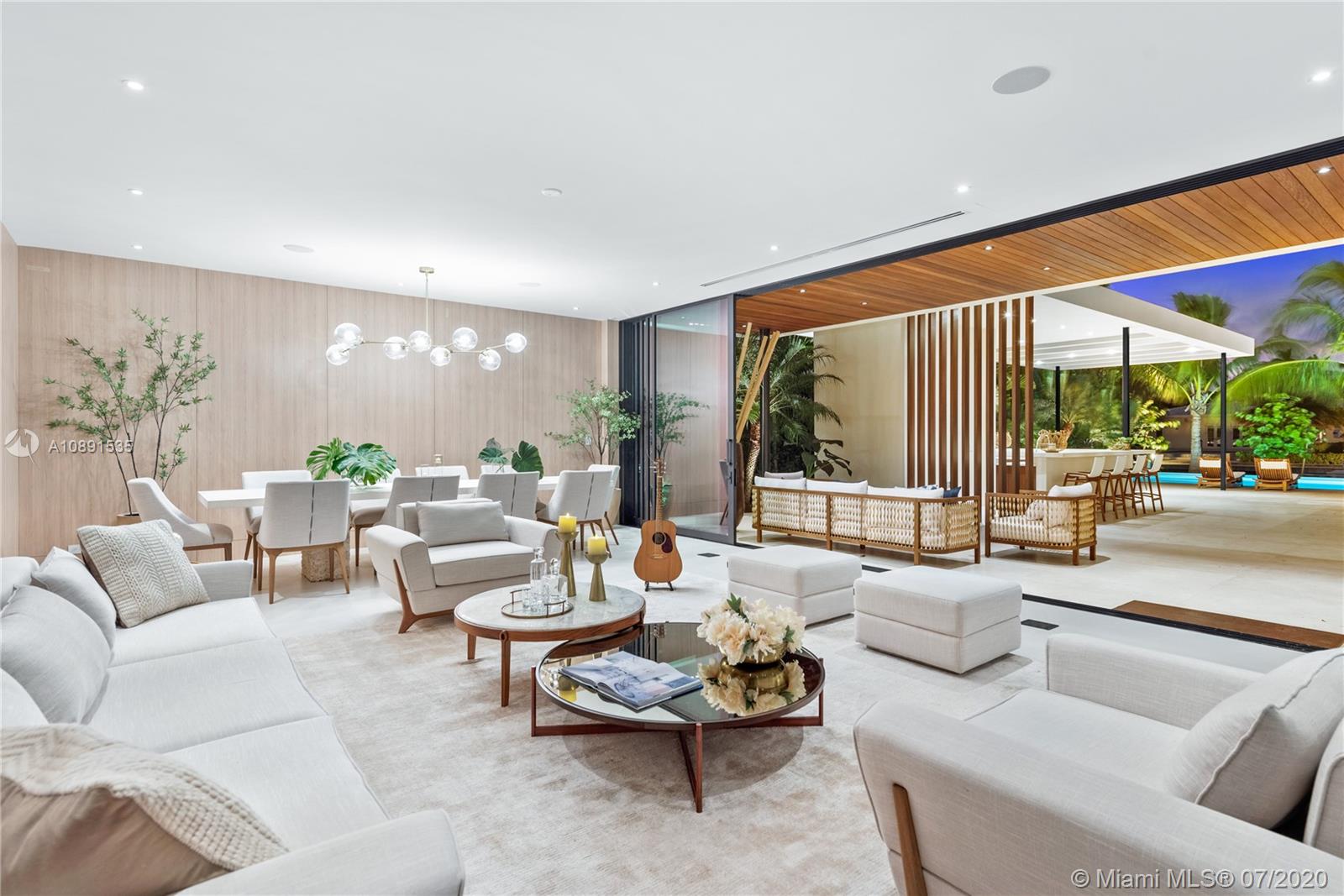 Sunset Islands Miami Beach, FL 33140 - Photo 68 of 72 a living room with furniture and a large window