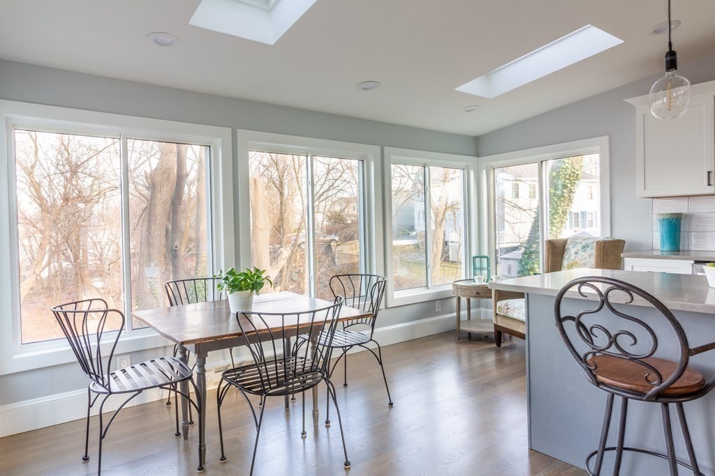 17 Andrews Street Danvers, MA 01923 - Photo 11 of 42 a living room with furniture and floor to ceiling windows