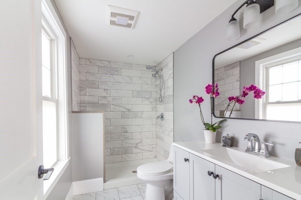 17 Andrews Street Danvers, MA 01923 - Photo 16 of 42 a bathroom with a sink toilet and shower