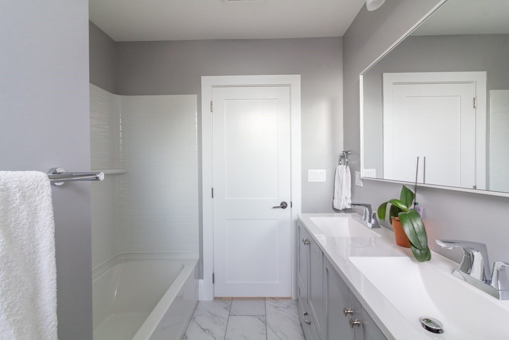 17 Andrews Street Danvers, MA 01923 - Photo 26 of 42 a bathroom with a sink and a shower