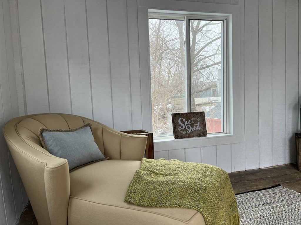 17 Andrews Street Danvers, MA 01923 - Photo 39 of 42 a living room with a couch and a large window