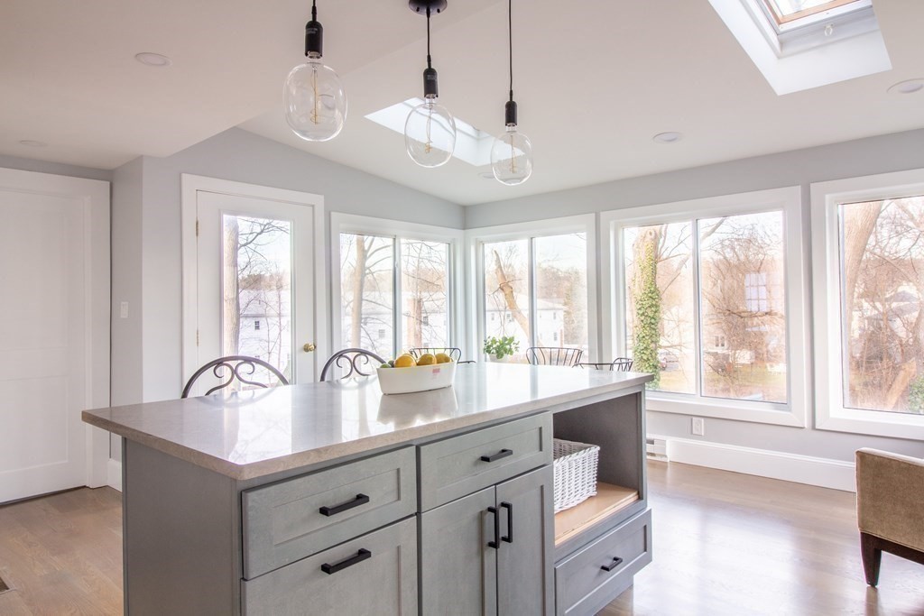 17 Andrews Street Danvers, MA 01923 - Photo 9 of 42 a large white kitchen with a large window
