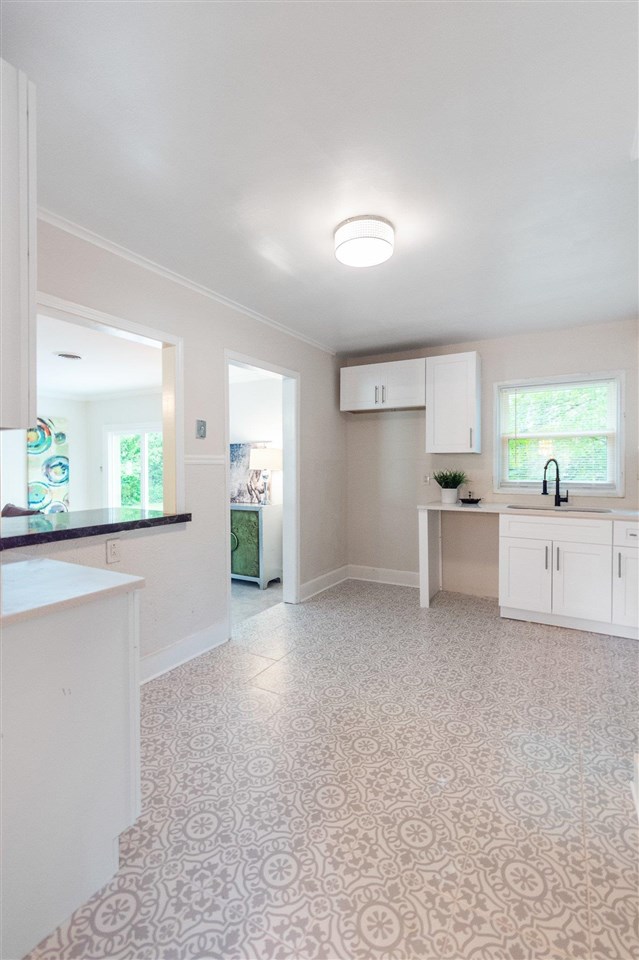 371 Wallace Road Memphis, TN 38117 - Photo 13 of 21 a view of a kitchen with a sink and a window