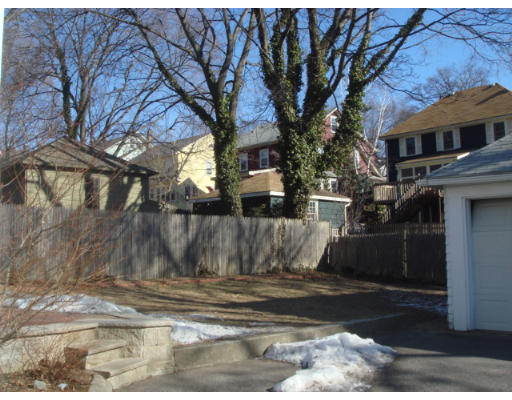 149 Common Street Watertown, MA 02472 - Photo 19 of 19 a view of a house with a yard