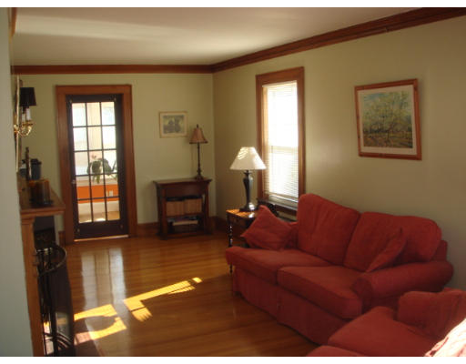 149 Common Street Watertown, MA 02472 - Photo 3 of 19 a living room with furniture and a window