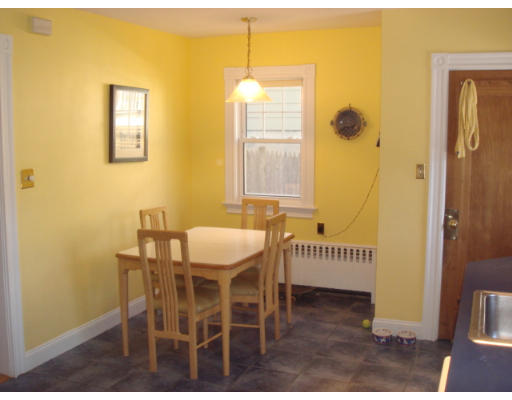 149 Common Street Watertown, MA 02472 - Photo 10 of 19 a dining room with furniture and a window